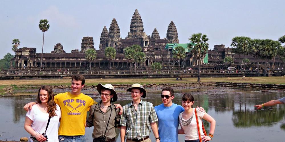 The Sustainable Development and CSB teams posing in front of the Reflection Pool at Angkor Wat